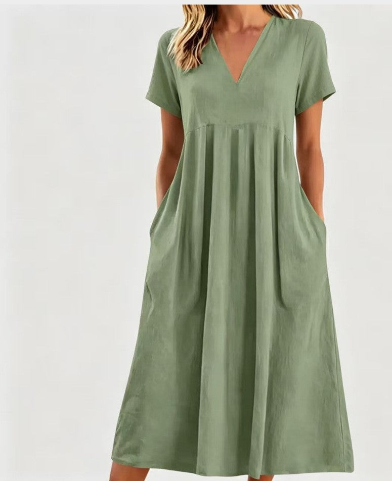 Women nan legeres V-neck midi dress with side pockets and gathered empire seam Mune Fashion