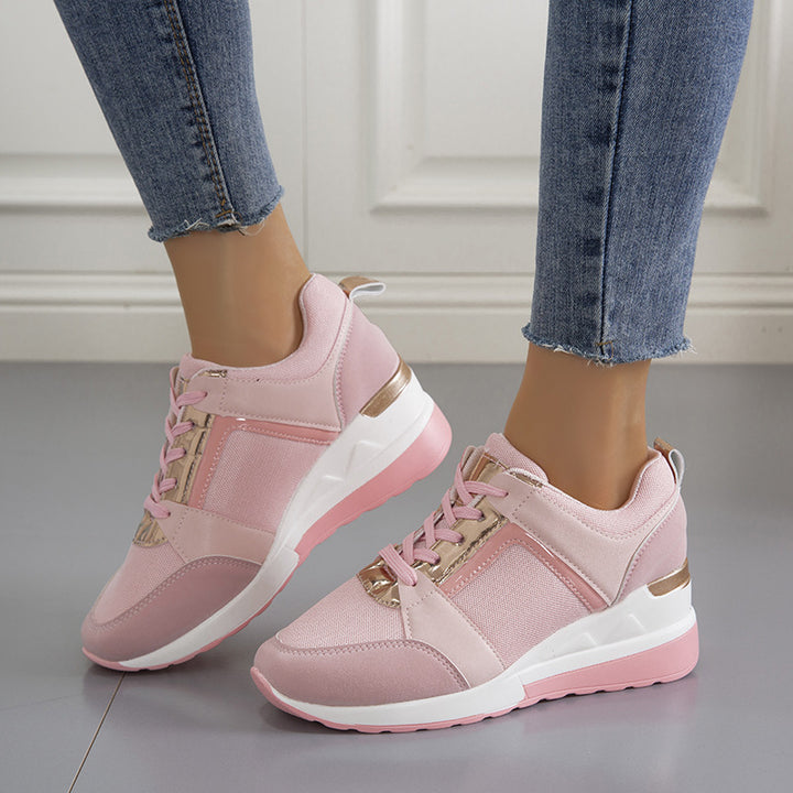 Women's sporty platform sneaker with perforated microfiber upper, cushioned comfort lining, and reflective decorative stripe Mune Fashion