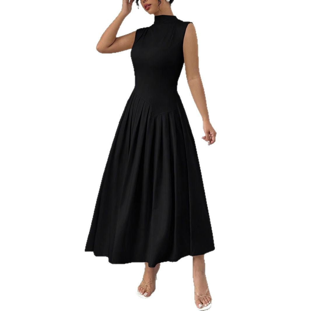 Women's sleeveless maxi dress with high standing collar, fitted bodice, and pleated skirt Mune Fashion