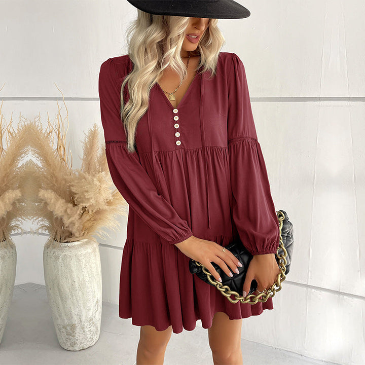 Ladies short-cut tiered babydoll dress with V-neck, button placket and balloon sleeves Mune Fashion