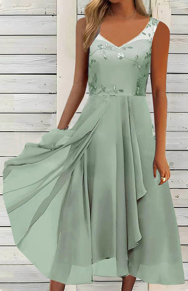 Women A-line chiffon dress with floral embroidered bodice, V-neck, draped godet swing and concealed side pockets Mune Fashion