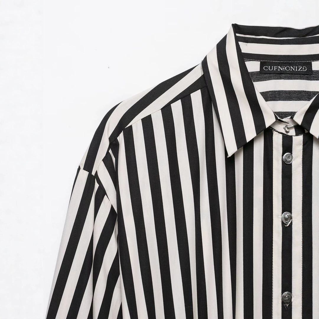 Ladies' shirt dress with vertical stripes and a prominent bow belt Drune