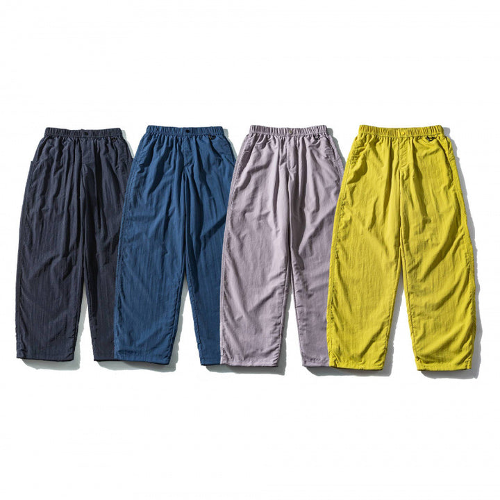 Unisex Loose Crinkle Pants with elastic drawstring waistband, drop-crotch, and side pockets Mune Fashion