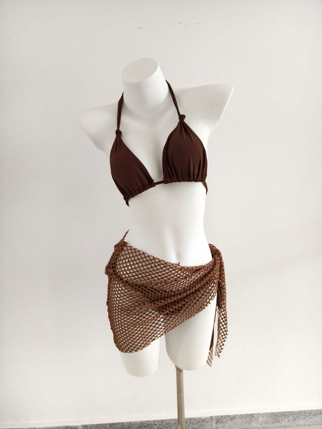 Ladies triangle bikini with trendy net skirt details Mune Fashion