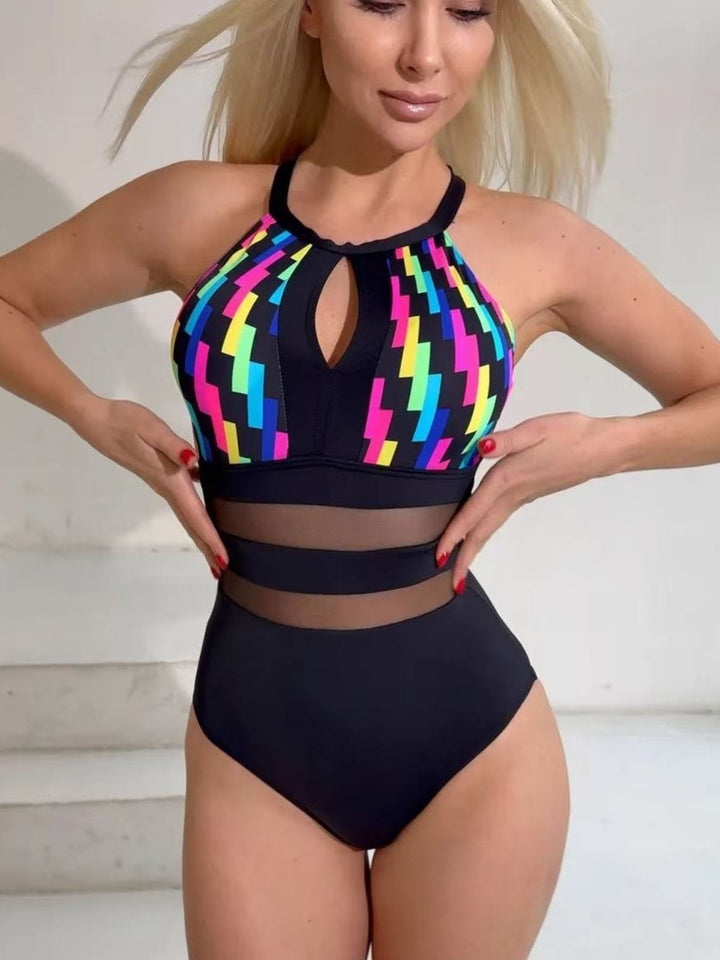 Women’s sporty swimsuit with fashionable mesh inserts Mune Fashion