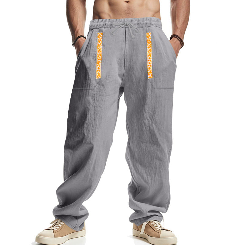 Men's loose-fitting casual pants made of linen blend with elastic waistband, deep side pockets, and ethnic decorative band Mune Fashion