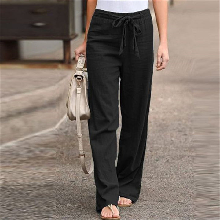 Women's loose linen pants with drawstring waistband, straight leg and side pockets Mune Fashion