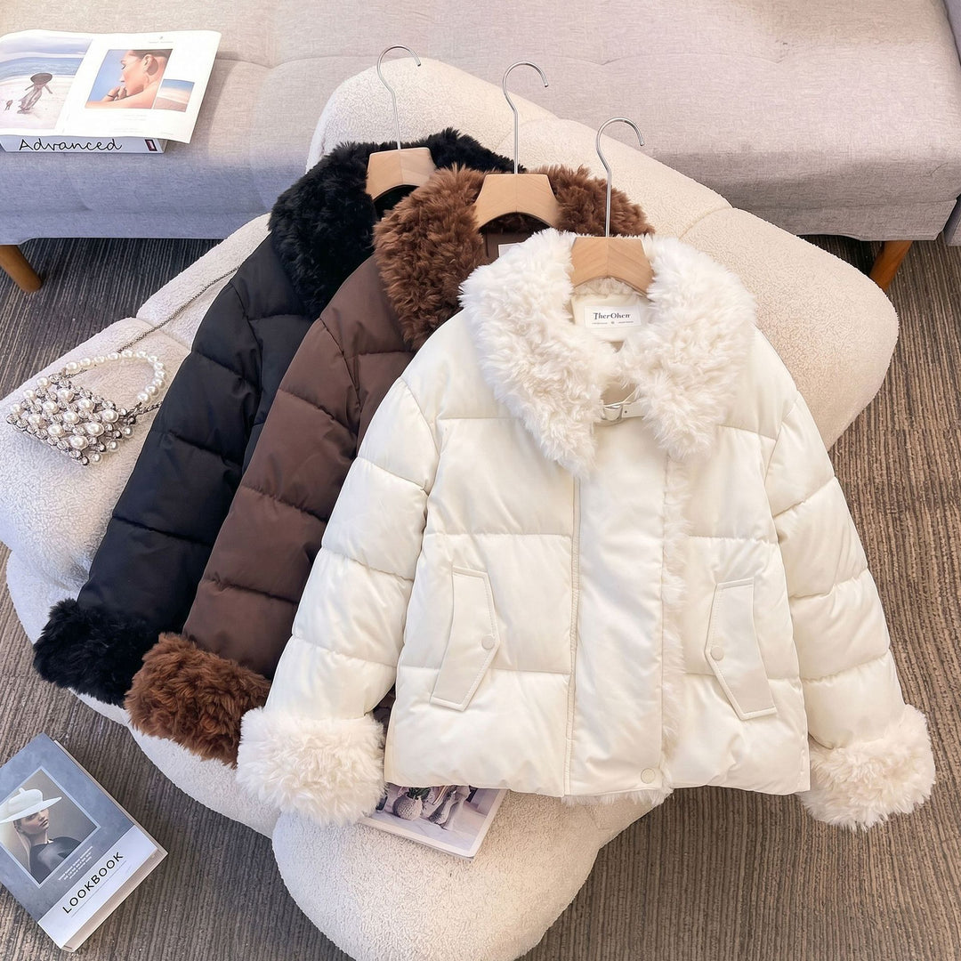 Women's fitted quilted jacket with voluminous teddy collar and detachable pom-pom details Mune Fashion