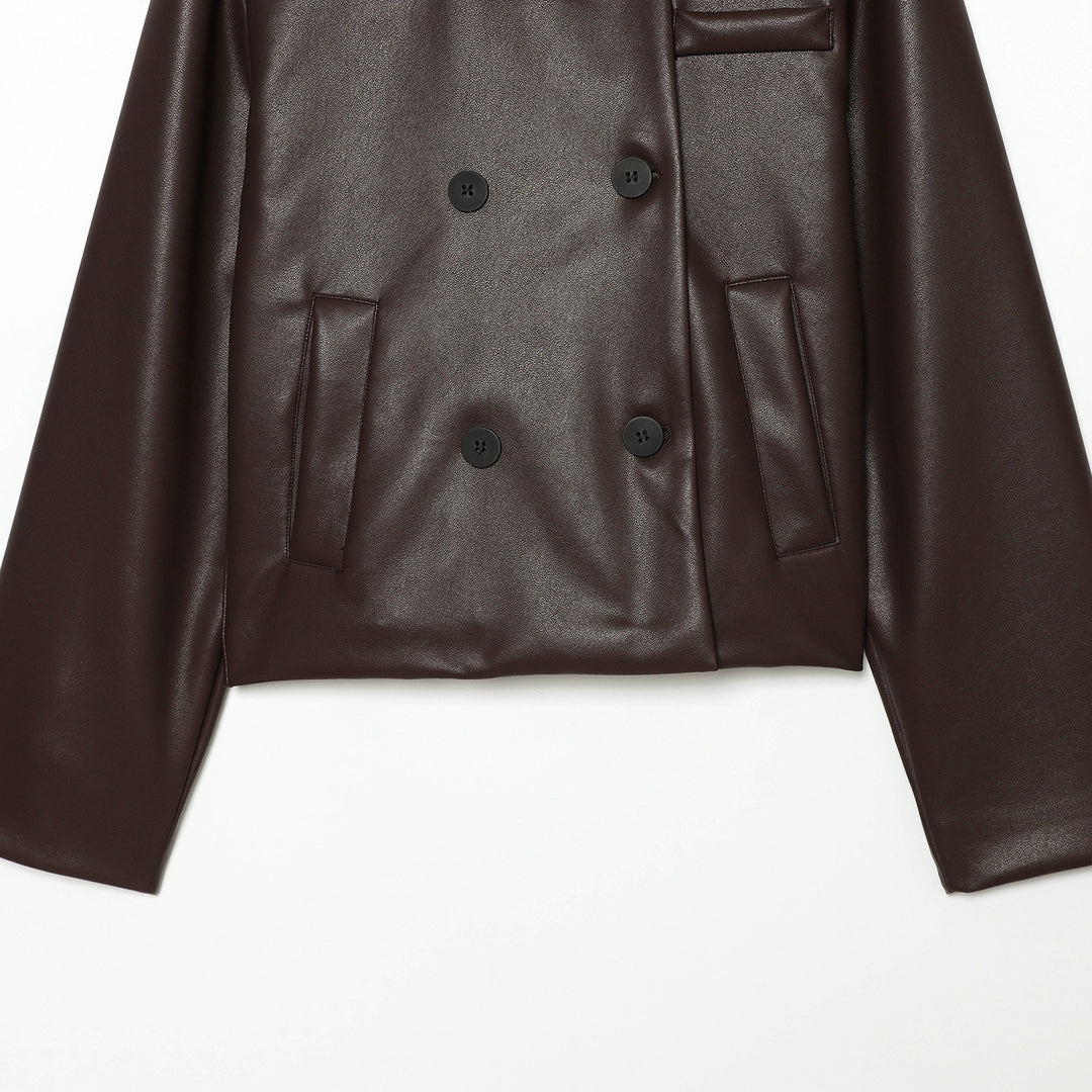 Women's double-breasted cropped coat made of faux leather with a large lapel collar and flap pockets Mune Fashion