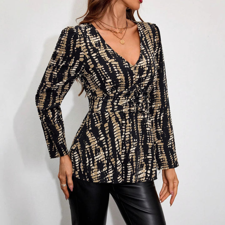 Women’s V-neck Peplum blouse with wrap effect and graphic print Mune Fashion