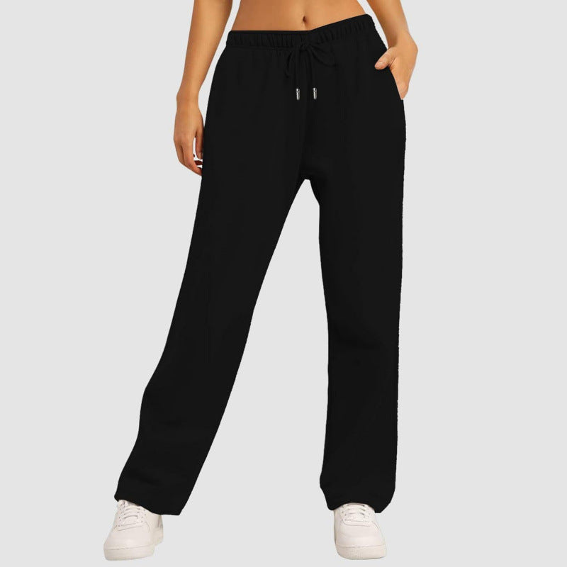 Women's flowing high-waist palazzo lounge pants made of lightweight jersey with elastic waistband and practical side pockets Mune Fashion