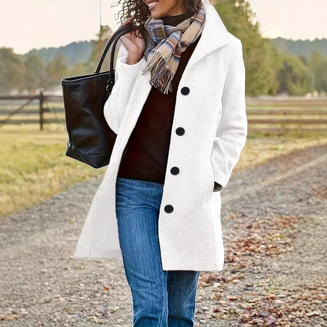 Women's tailored wool blend coat with large button placket and side pockets Mune Fashion