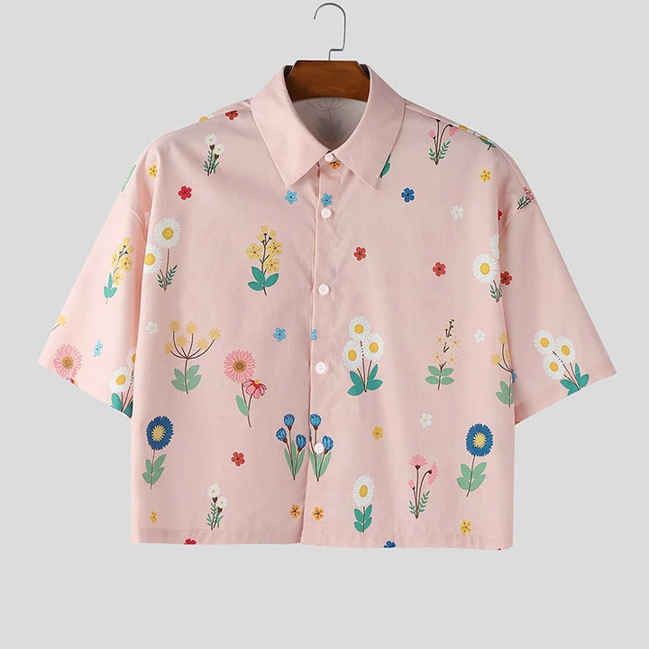 Women's loosely cut short sleeve shirt blouse with floral all-over print, shirt collar and short hem Mune Fashion