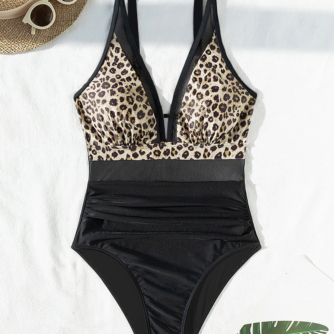 Women's Elegant Swimsuit with Animal Print and Transparent Inserts Mune Fashion