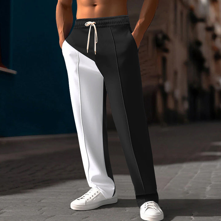 Men's casual jogging pants with asymmetric cut and elastic waistband Mune Fashion