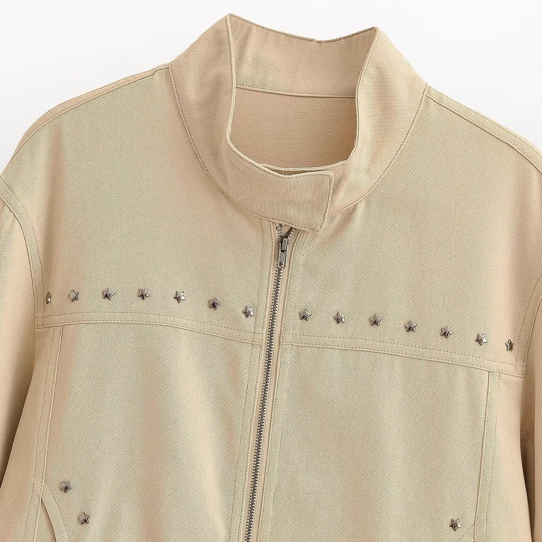 Women’s short-cut vegan leather jacket with stand-up collar, full-length zipper and star stud detail Mune Fashion