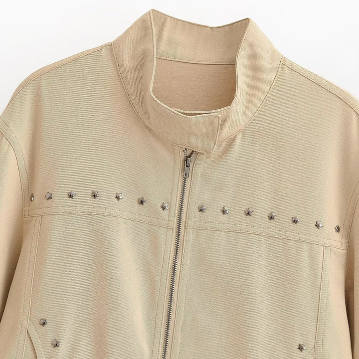 Women’s short-cut vegan leather jacket with stand-up collar, full-length zipper and star stud detail Mune Fashion