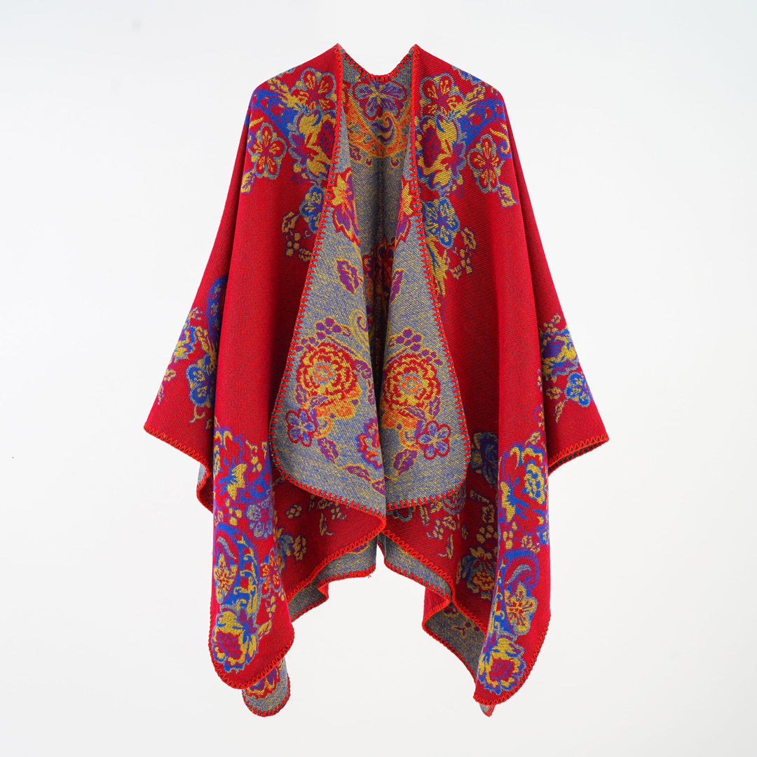 Women's jacquard poncho made of wool blend with floral pattern and overlock edge