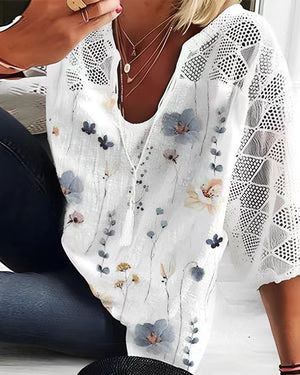 Women's V-neck tunic with lace-knit sleeves and subtle watercolor floral print Mune Fashion