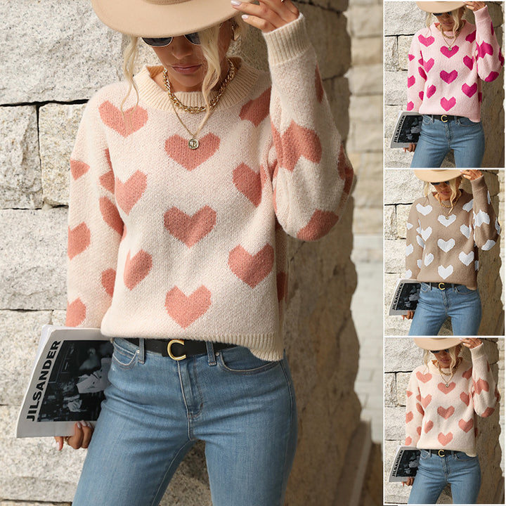 Women's sweater with heart all-over pattern, round neckline and relaxed fit.