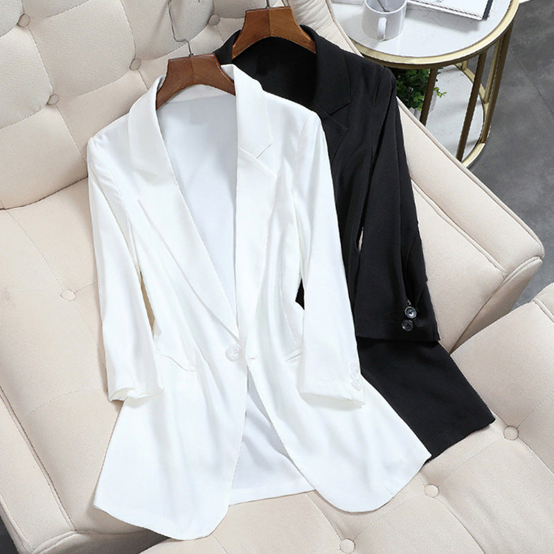 Women Lightweight fitted long blazer with falling hem and piped pockets Mune Fashion