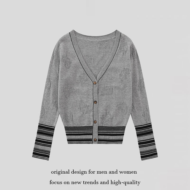 Ladies cardigan with V-neck, fine jacquard pattern and contrasting cuffs Mune Fashion