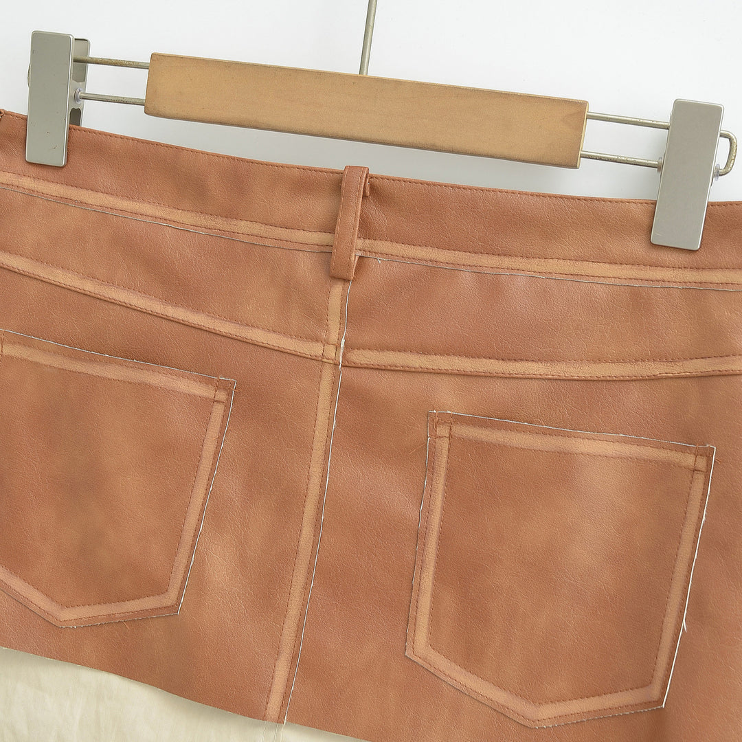 Ladies High-Waisted Faux Leather Mini Skirt with Decorative Seams and Belt Loops Mune Fashion
