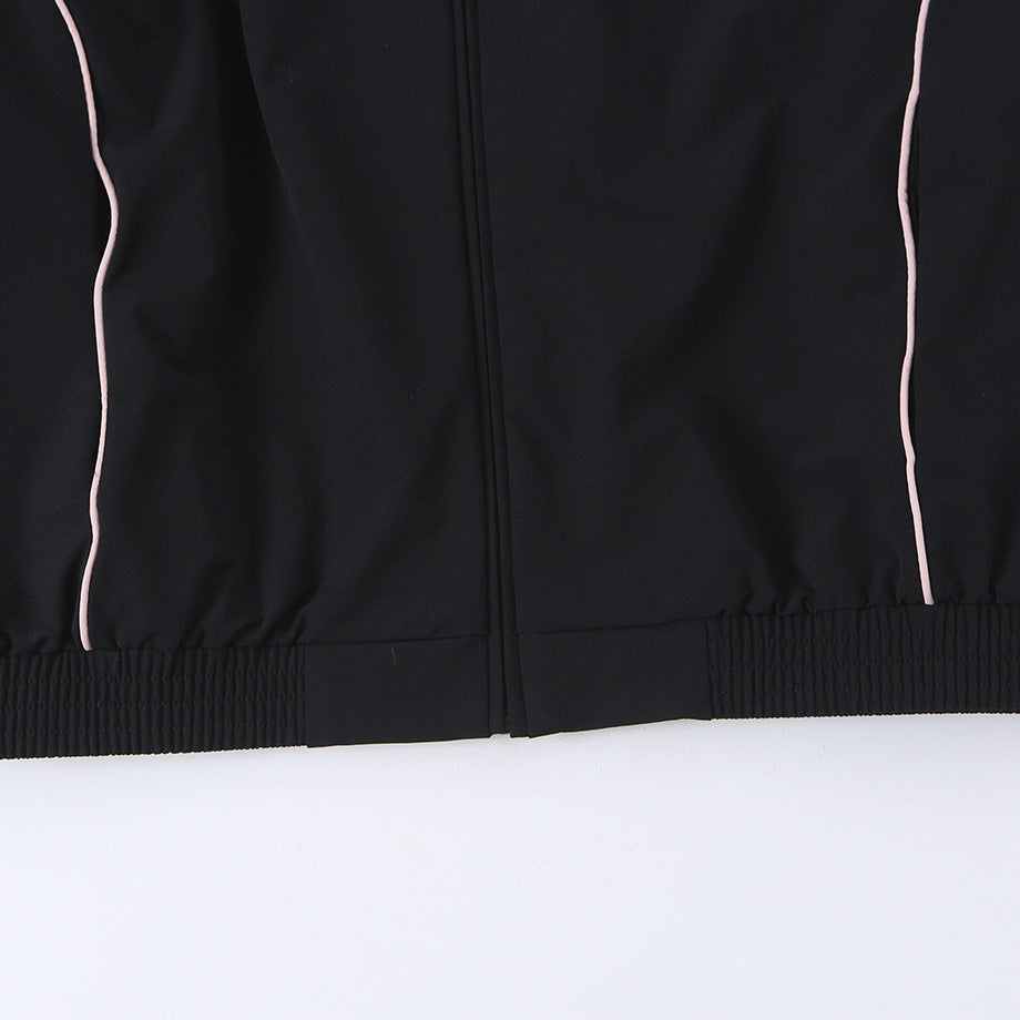 Women wide training pants with contrasting piping and elastic waistband Mune Fashion