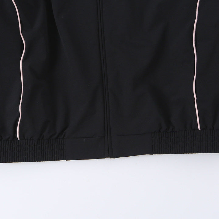 Women wide training pants with contrasting piping and elastic waistband Mune Fashion
