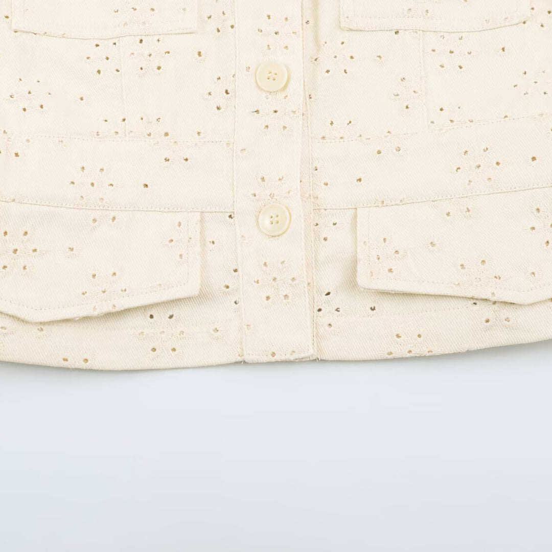 Ladies short jacket made of broderie anglaise with stand-up collar and patch pockets Mune Fashion