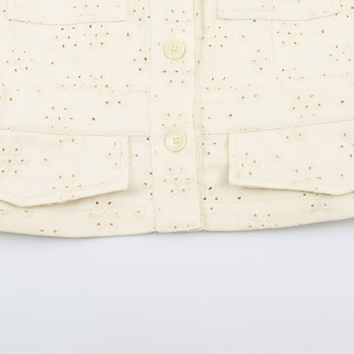 Ladies short jacket made of broderie anglaise with stand-up collar and patch pockets Mune Fashion