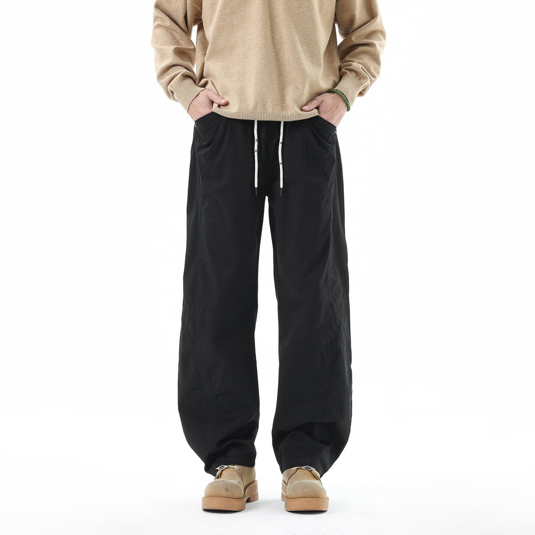 Men's Light Relaxed-Fit Trousers with Drawstring, Slanted Side Pockets and Panel Seams Mune Fashion
