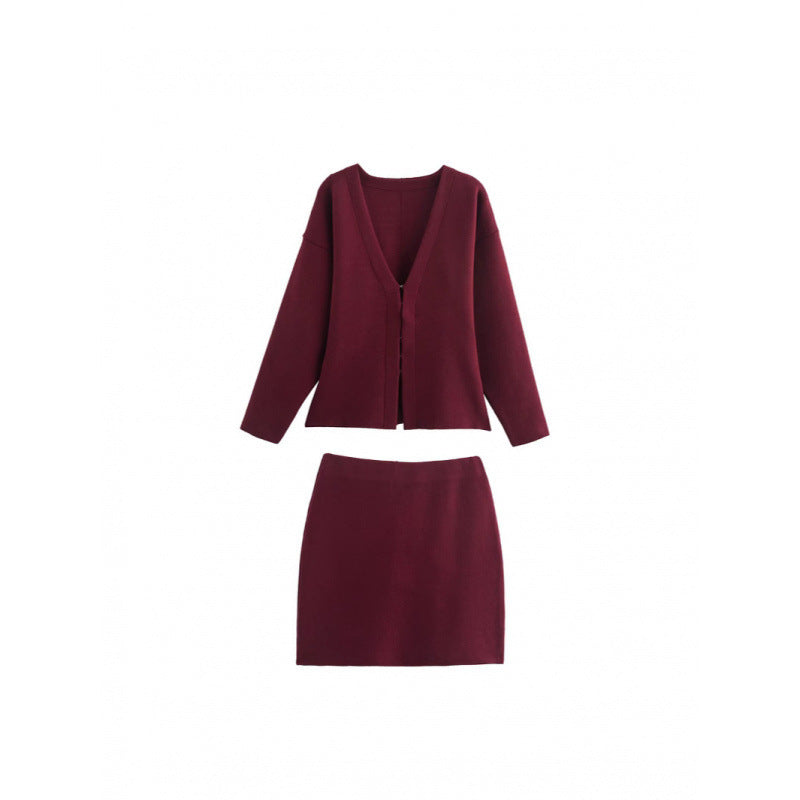 Women loosely fitted fine knit cardigan with deep V-neck and concealed button placket Mune Fashion