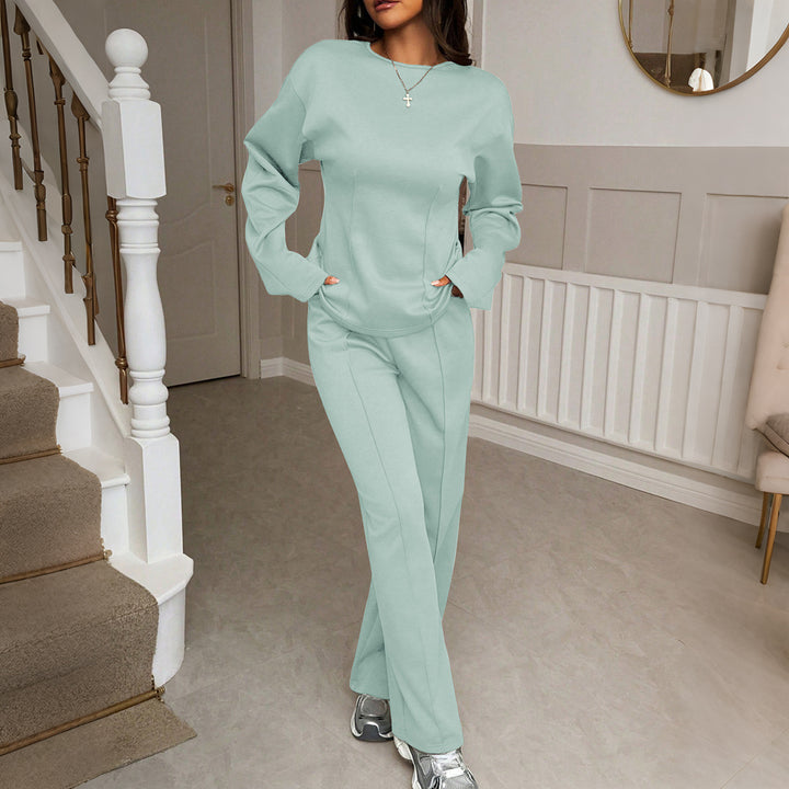 Women's soft lounge set with fitted sweatshirt, sculpting seam details, and wide palazzo pants leg Mune Fashion