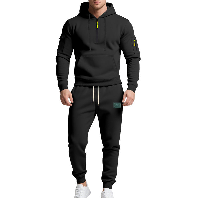 Men's half-zip hoodie and tapered jogger set with kangaroo pocket, zipper details, and elastic drawstring waistband Mune Fashion
