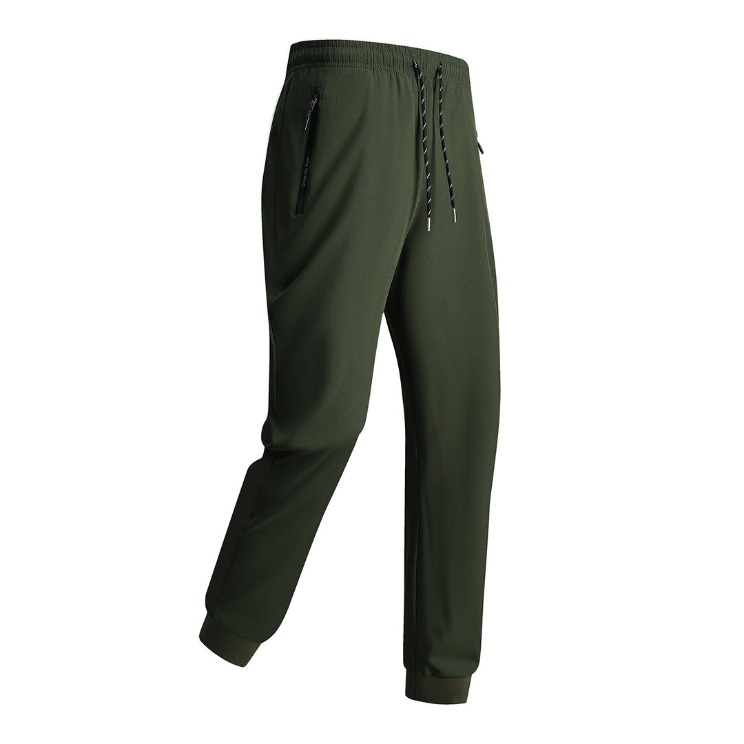 Men's sporty training pants with elastic waistband and zippered pockets Mune Fashion
