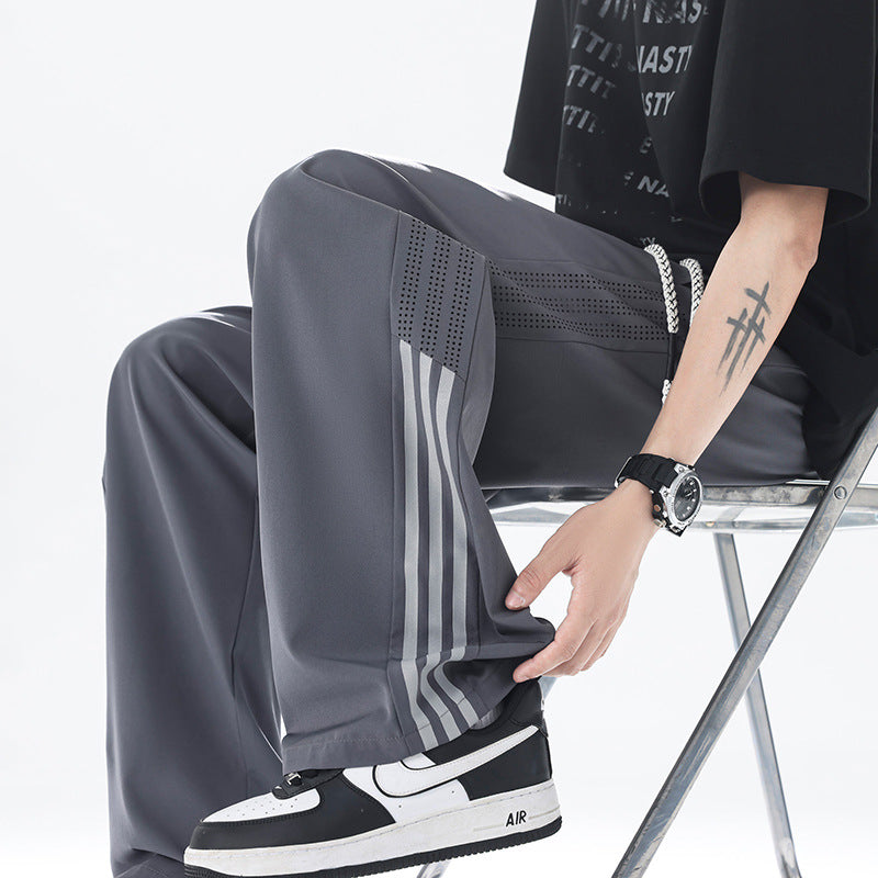 Men's sporty jogging pants with breathable inserts