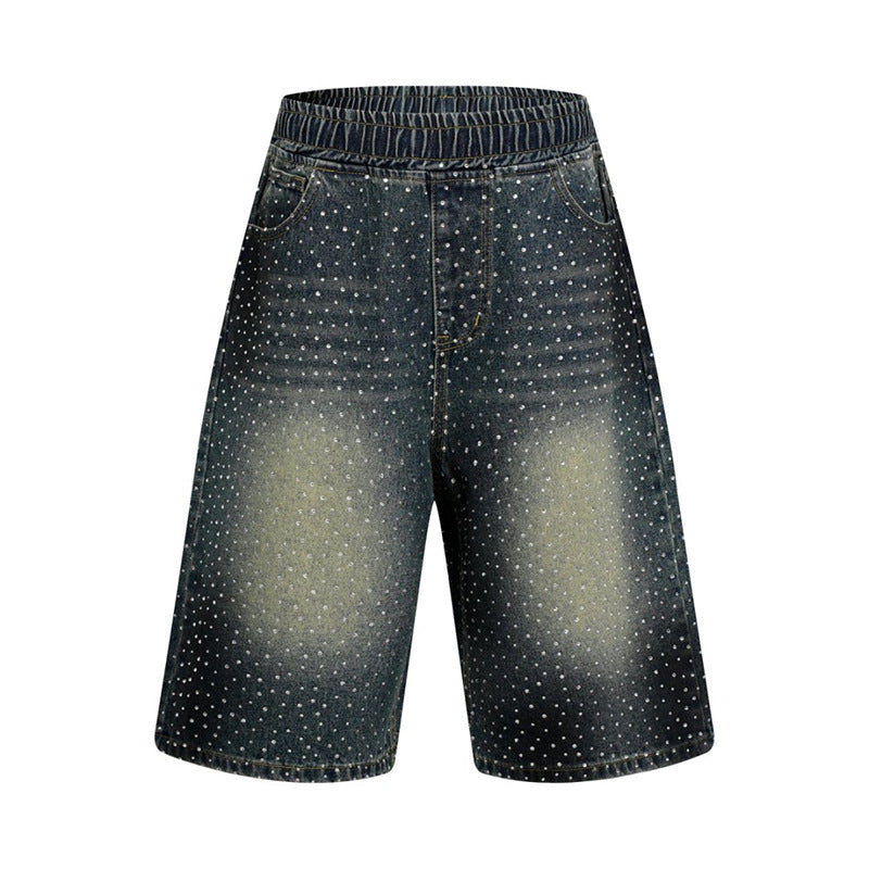 Women's high-waisted denim culotte shorts with comfort waistband and subtle polka dot pattern Mune Fashion