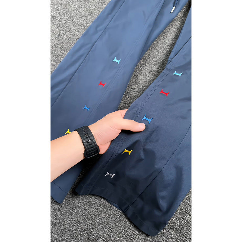 Women's sporty leisure pants with elastic waistband and colorful detail Mune Fashion