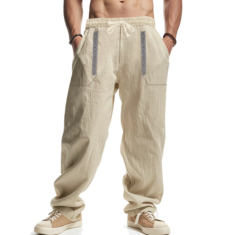 Men's loose-fitting casual pants made of linen blend with elastic waistband, deep side pockets, and ethnic decorative band Mune Fashion
