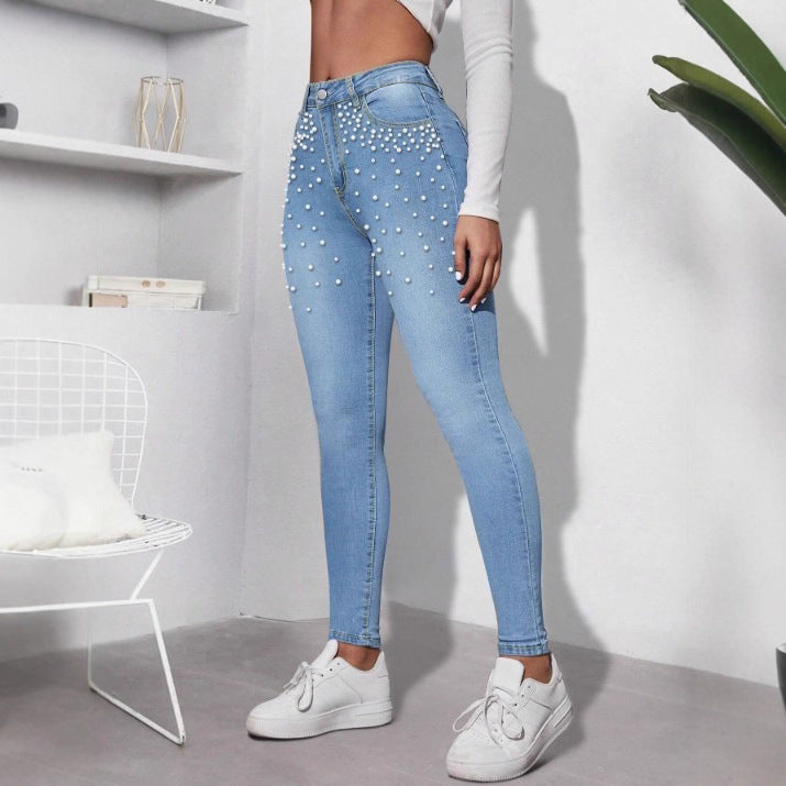 Ladies High-Waist Skinny Jeans with decorative pearl cluster and sculpting cut Mune Fashion