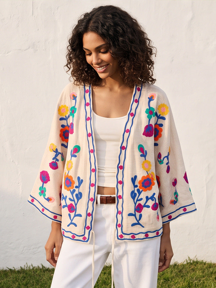 Women embroidered linen wrap jacket with folkloric flower appliqués Mune Fashion