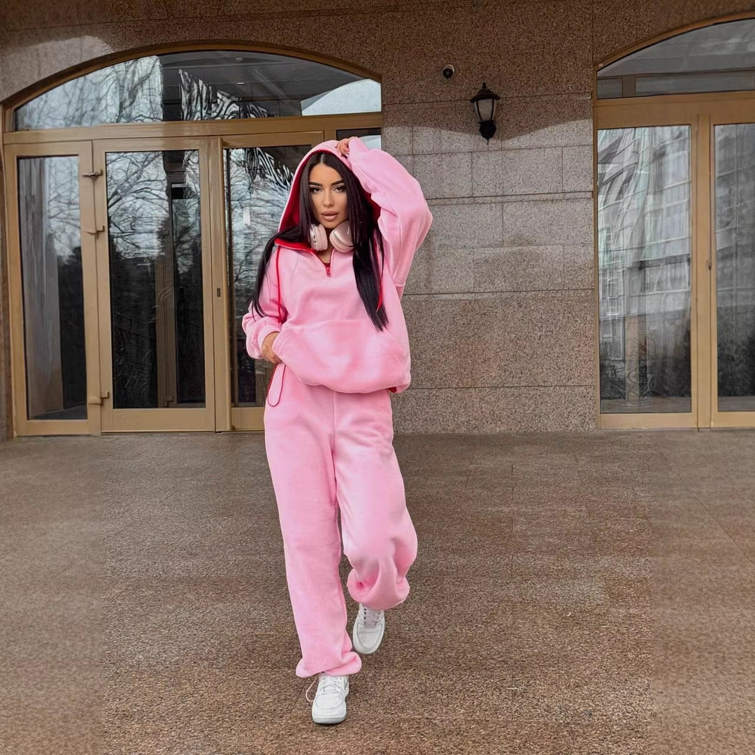 Women's fleece loungewear set with half front zip, lined hood and high cut comfort pants Mune Fashion