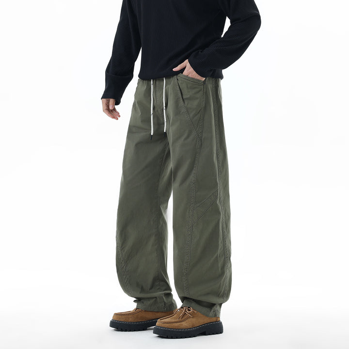 Men's Light Relaxed-Fit Trousers with Drawstring, Slanted Side Pockets and Panel Seams Mune Fashion