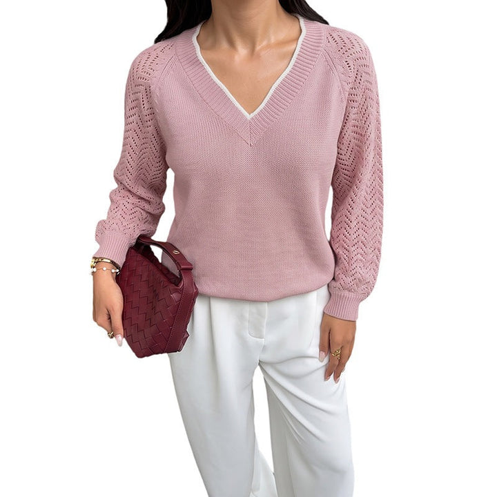 Women's fine knit sweater with deep V-neck, openwork sleeves, and ribbed hem Mune Fashion