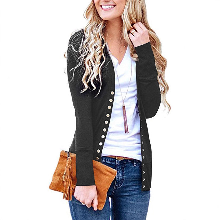 Women's fine knit cardigan with decorative metallic buttons and slim silhouette Mune Fashion