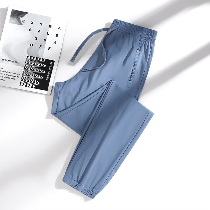 Men's sporty jogging pants with adjustable waistband and zippered pockets Mune Fashion