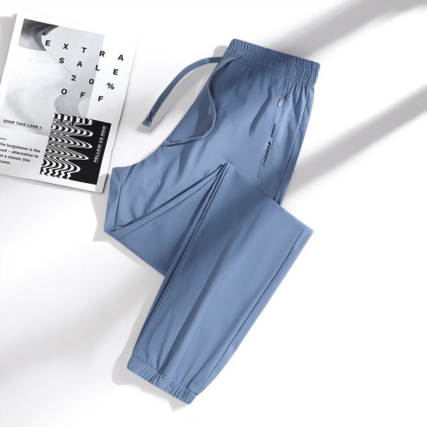 Men's sporty jogging pants with adjustable waistband and zippered pockets Mune Fashion