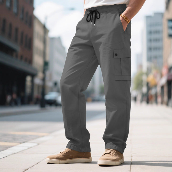 Men's urban utilitarian cargo pants with elastic comfort waistband, drawstring, and secure flap pockets Mune Fashion