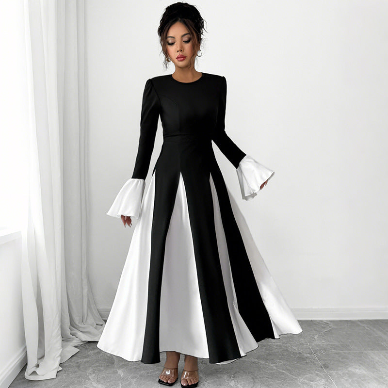 Ladies evening dress with fitted corset top, long sleeves and contrasting flounce cuffs Mune Fashion